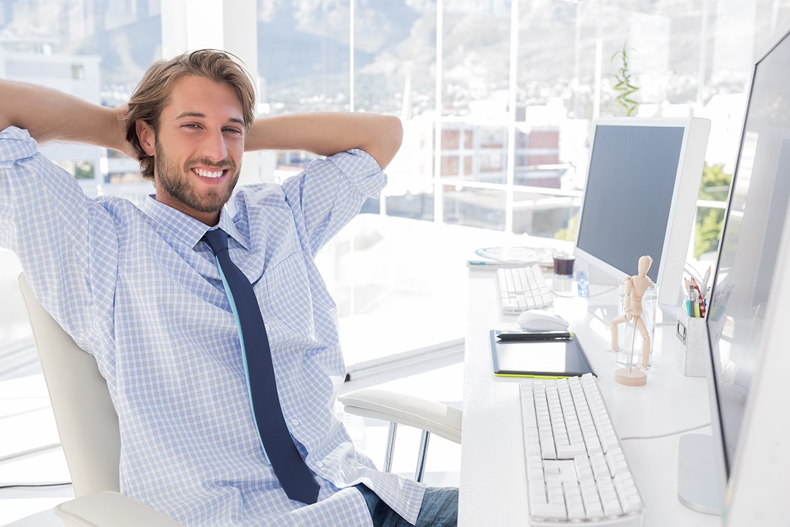 bigstock-Smiling-designer-at-his-desk-i-45846217.jpg